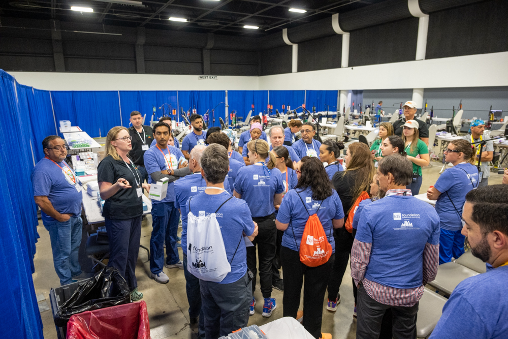 Attendees with backpacks